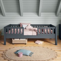 arven junior bed with safety guard rails blue closer front view