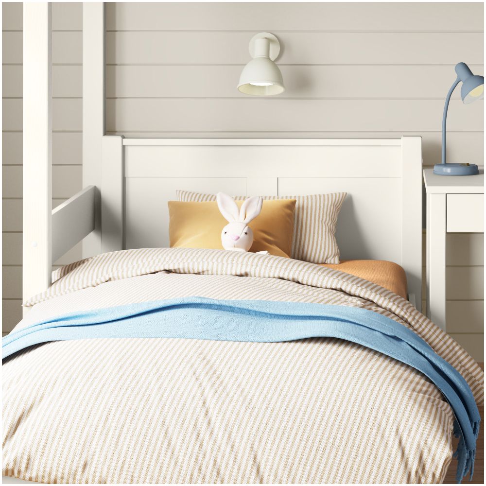 closer front view of the headboard on the single bed under the white arven high sleeper with single bed and storage desk