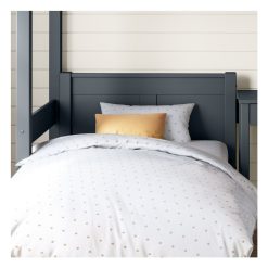 detailed front view of the headboard on the blue arven single bed under the arven high sleeper with single bed and storage desk
